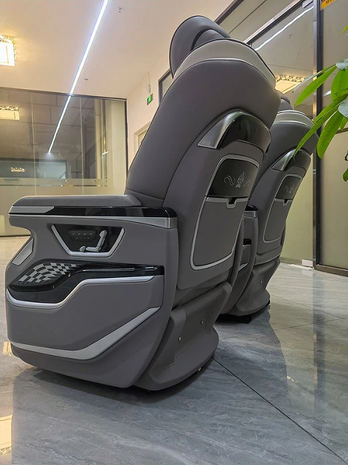 Luxury van seats with wireless charging and ambient lighting